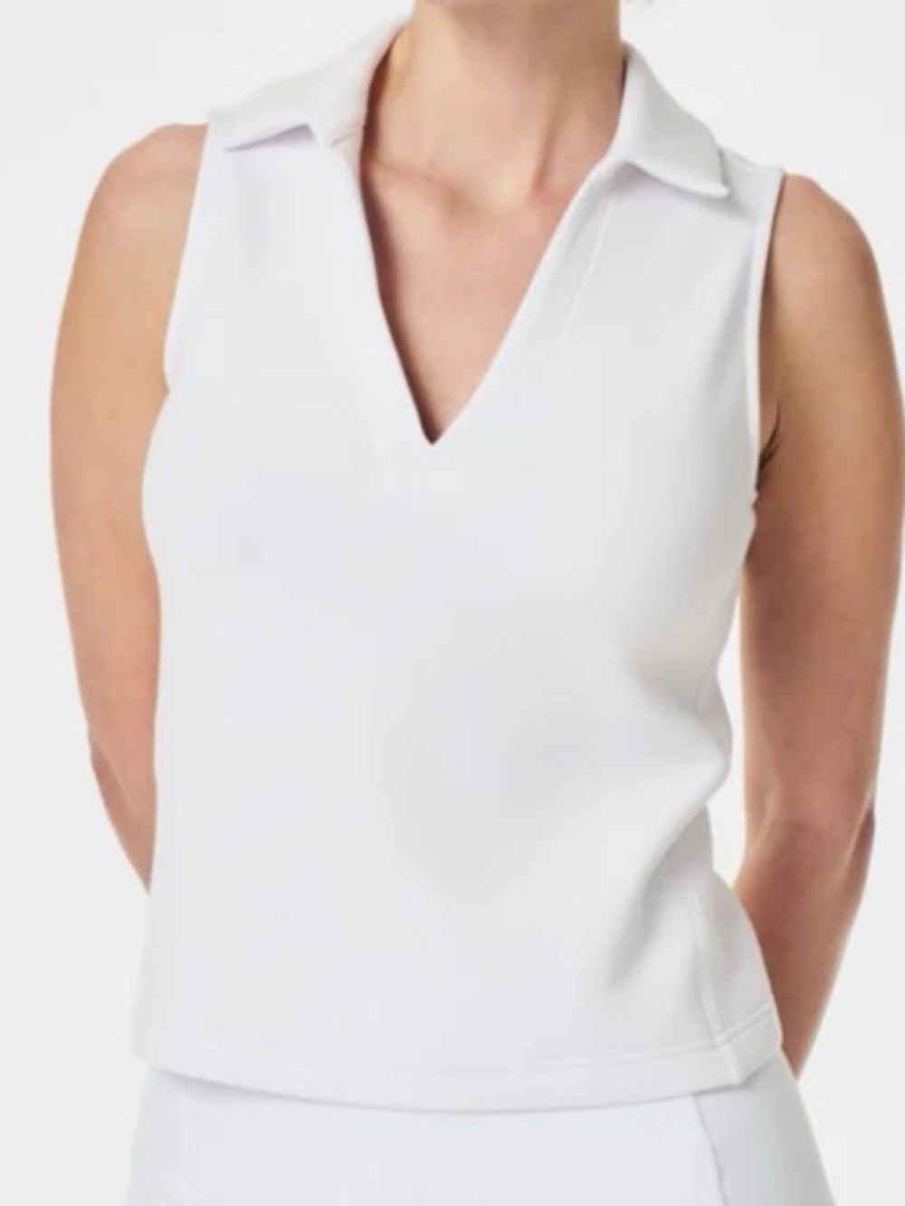 30. Spanx • NWT air essentials Sleeveless Collared V-Neck Top in White